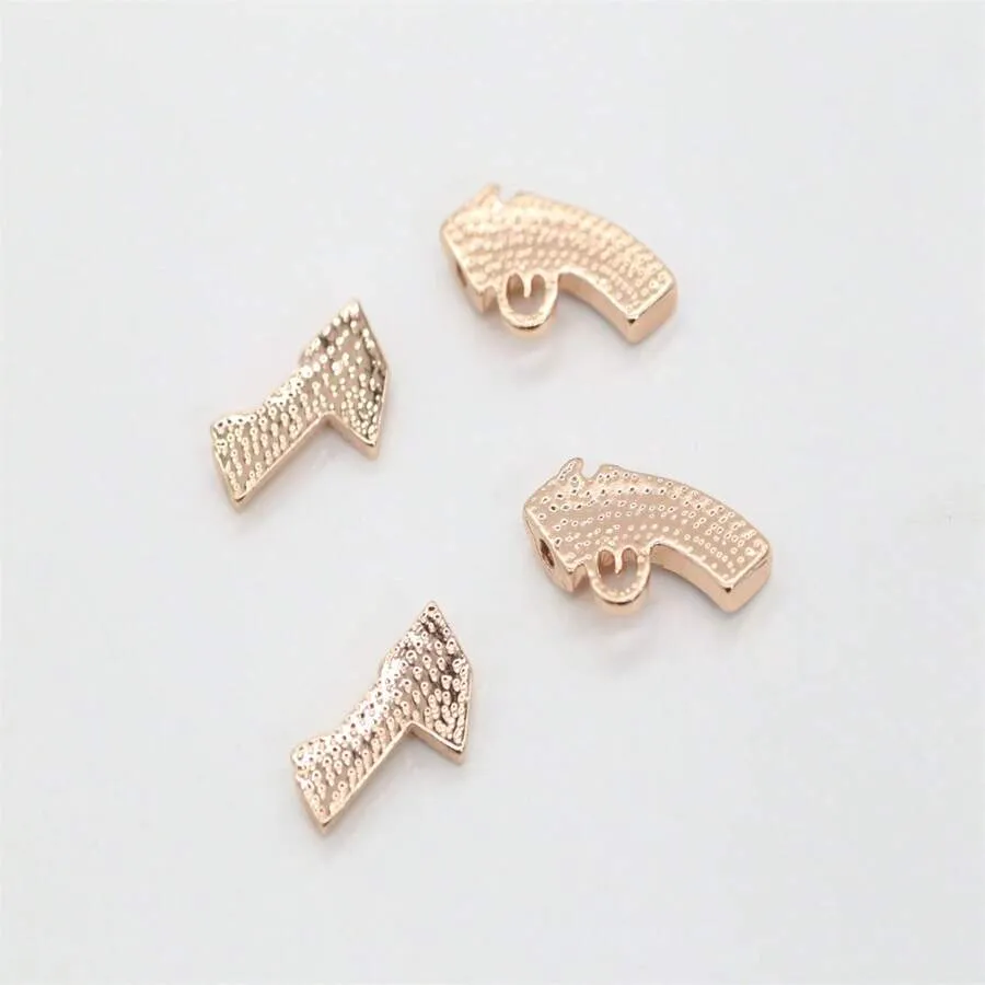 10011 1b-076 Anillos para pezones chapados en oro y con decoración de gemas