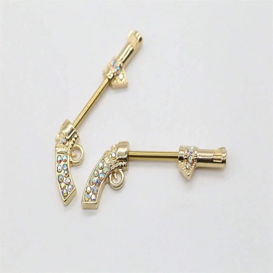 10011 1b-076 Anillos para pezones chapados en oro y con decoración de gemas