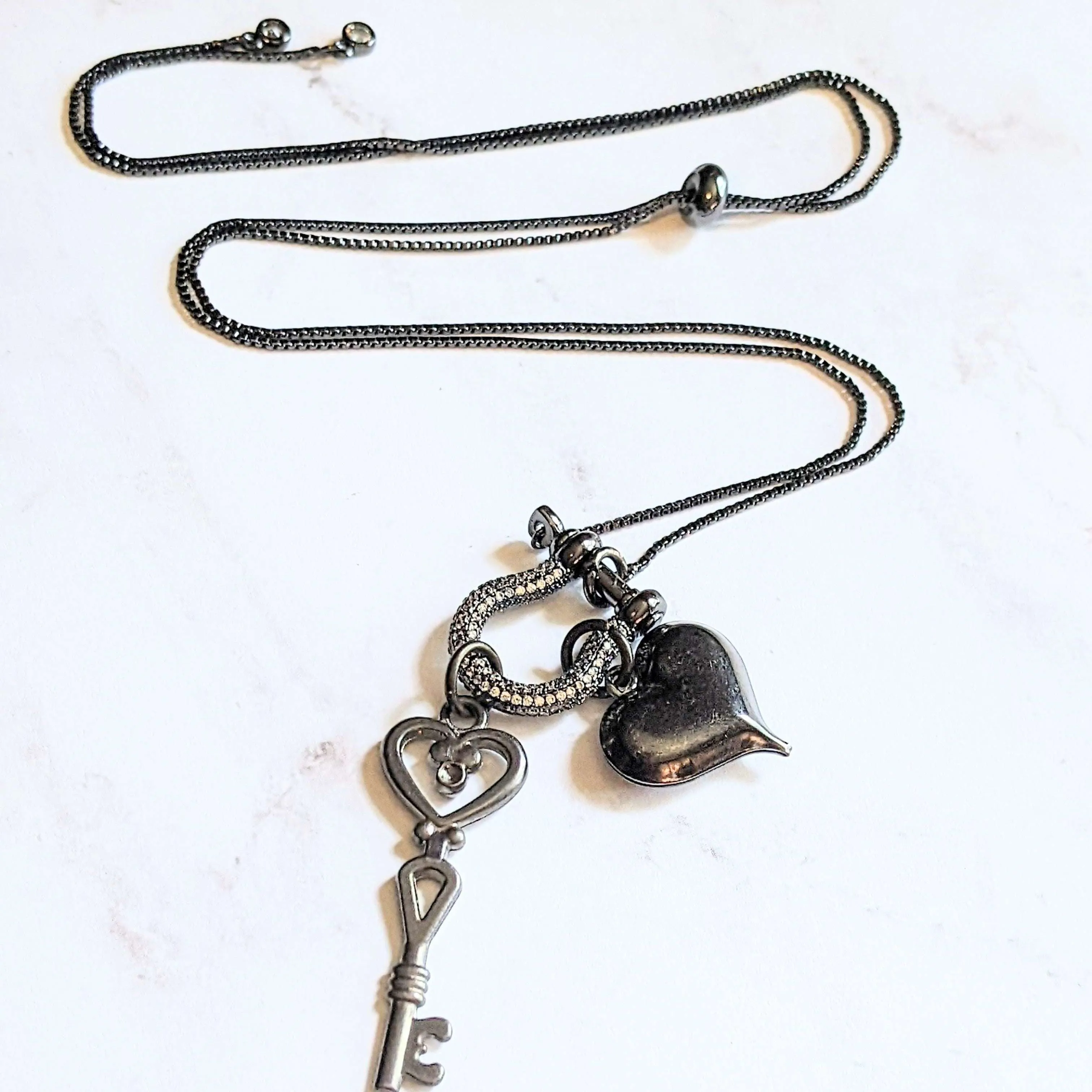 Black Heart Key Charm Necklace, adjustable up to 24 inches